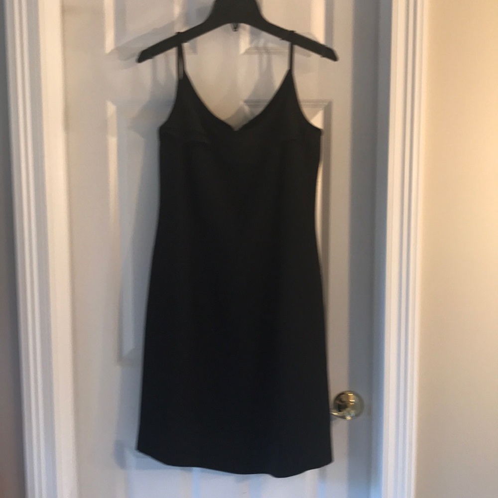 Black polyester dress. Super cute!